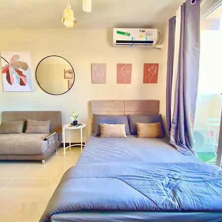 Cozy Condo Near Airport With Pool And Ocean View